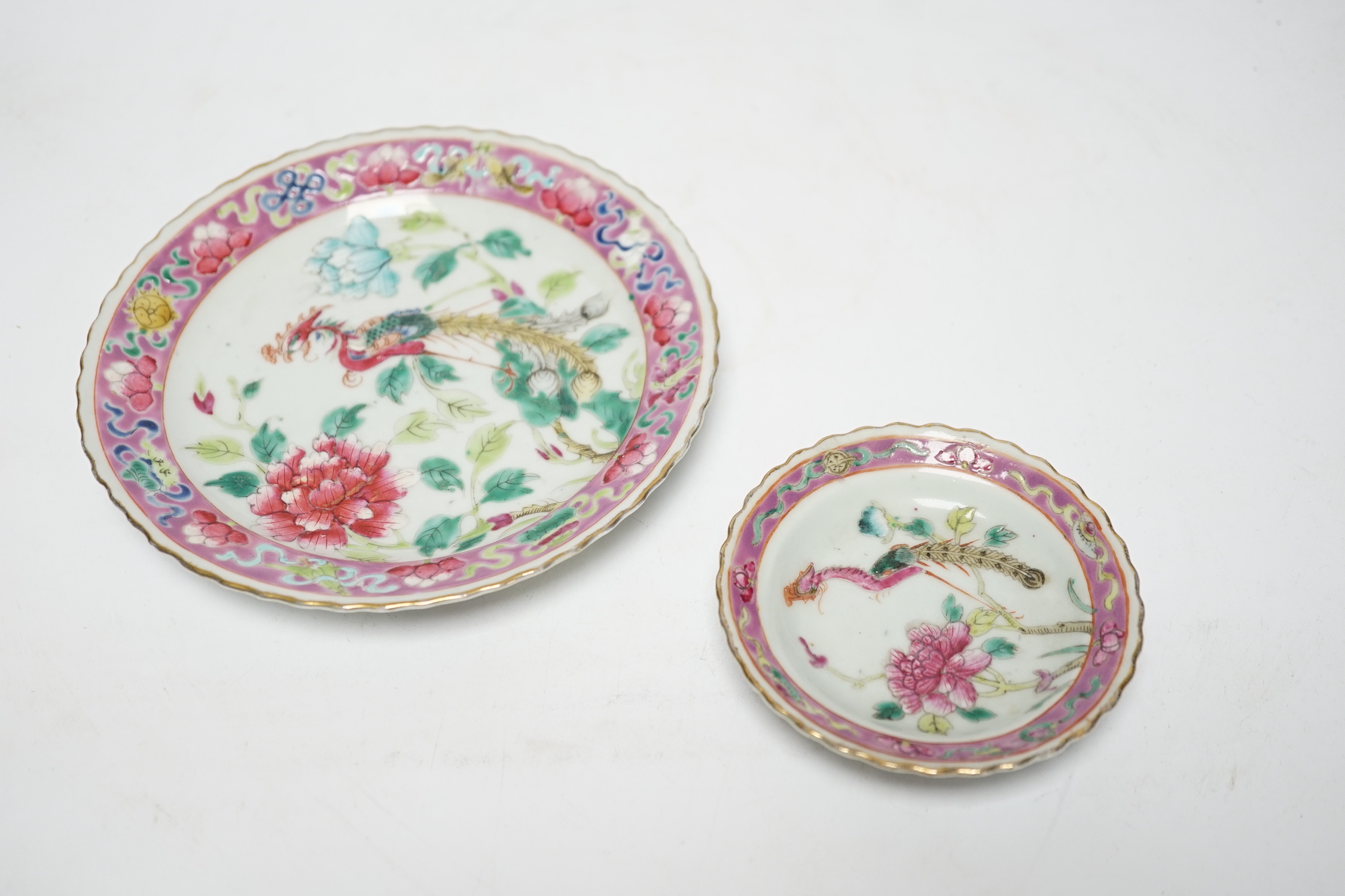 Two Chinese Straits Nonya ware famille rose tea bowls, larger 11cm diameter, and two saucer dishes, Guangxu period